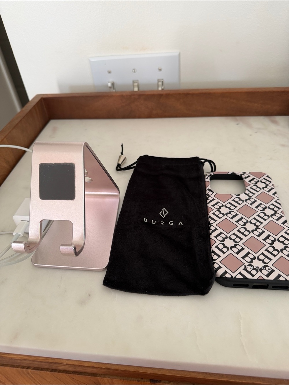 Burga Logo iPhone 17 Case with Omoton Rose Gold Stand and Apple charging cord